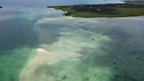 flyover above boat pass, remote northern point of new caledonia main island