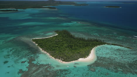 an islet off the isle of pines called ilot moro - high altitude aerial view