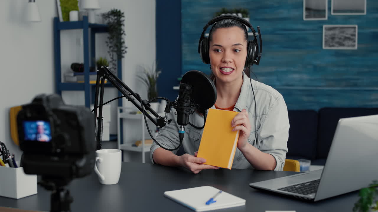 Creative digital content creator recording agenda review while in home studio