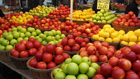 vibrant market display of fresh apples in various colors showcasing the abundance of nature's harvest at a local marketplace