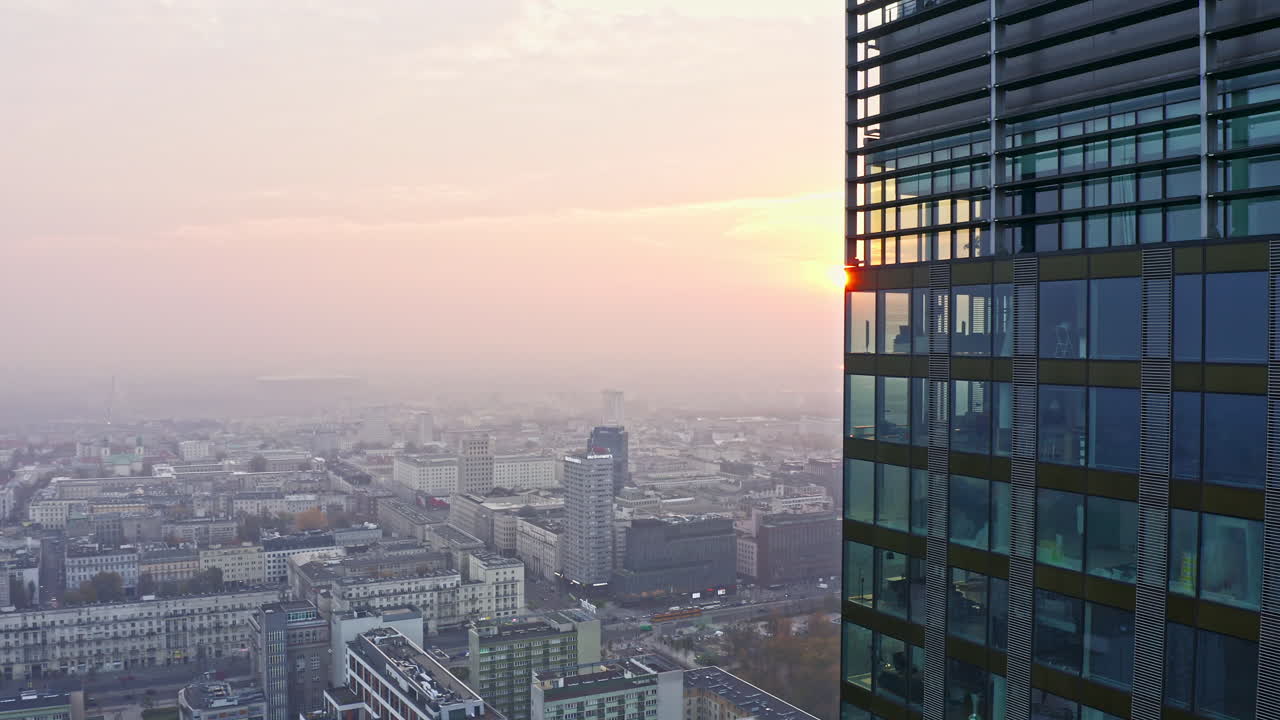 City Skyline At Sunset In Warsaw, Poland. Aerial Drone Shot