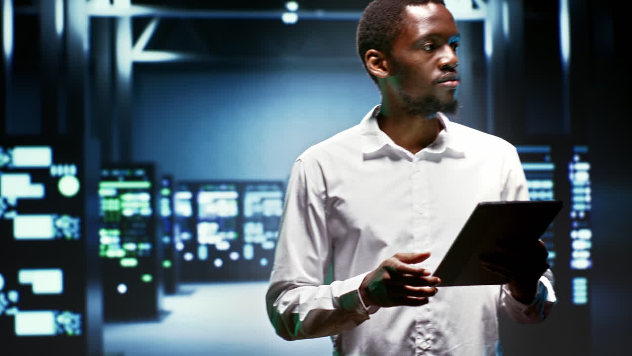 Electrician inspecting server hub