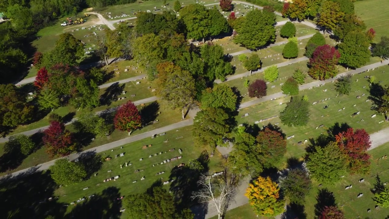 Burial Ground With Dense Maple Trees At Maplewood Cemetery In Harrison, Arkansas, United States. Aerial Drone Shot