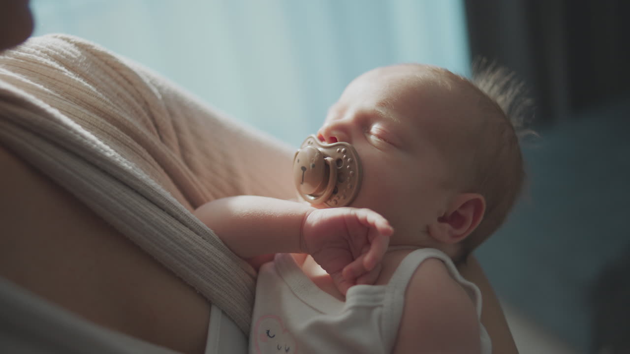 Baby Sleeping in a Baby Carrier