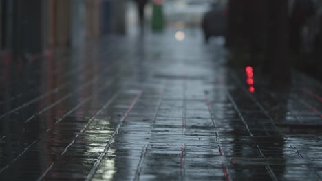 blurry street in rainy evening