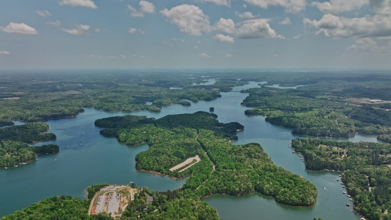 Lake Hartwell Georgia Aerial v2 cinematic drone flyover Gumlog lakeside homes capturing Tugaloo State Park and pristine nature landscape on a sunny day in summer - Shot with Mavic 3 Cine - April 2022