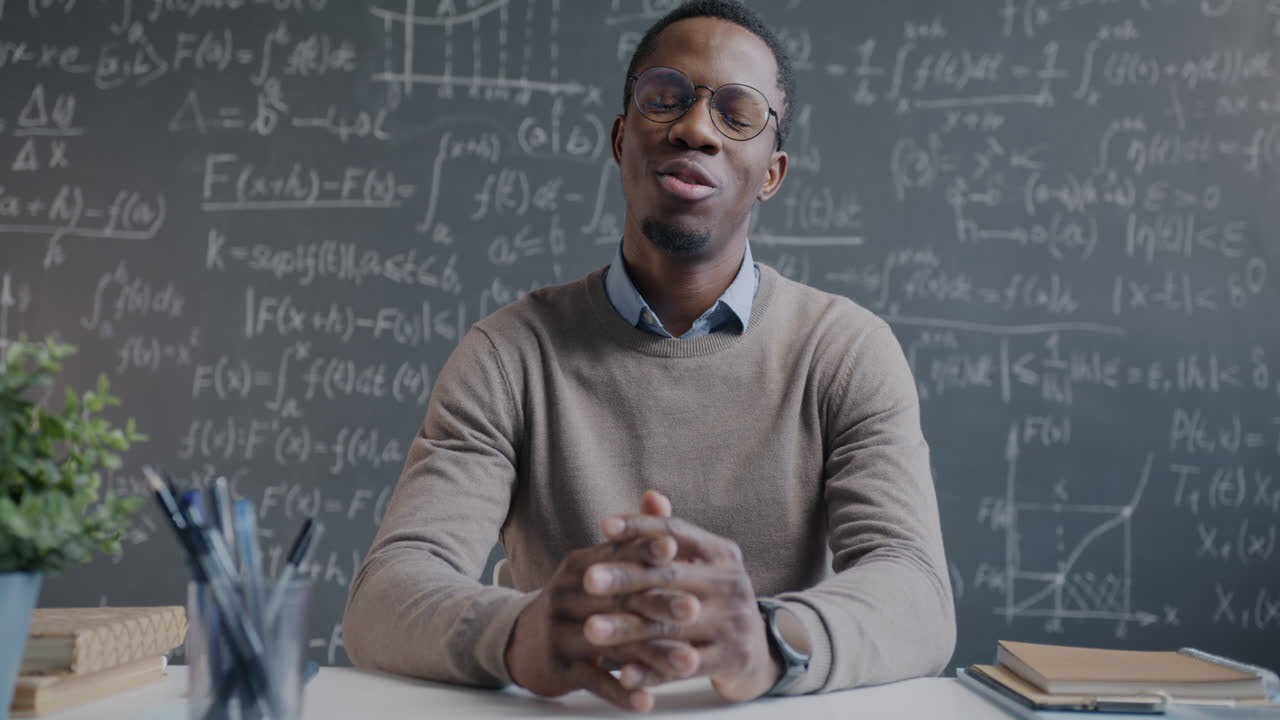 Teacher Explaining Math in a Classroom