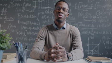 teacher explaining math in a classroom