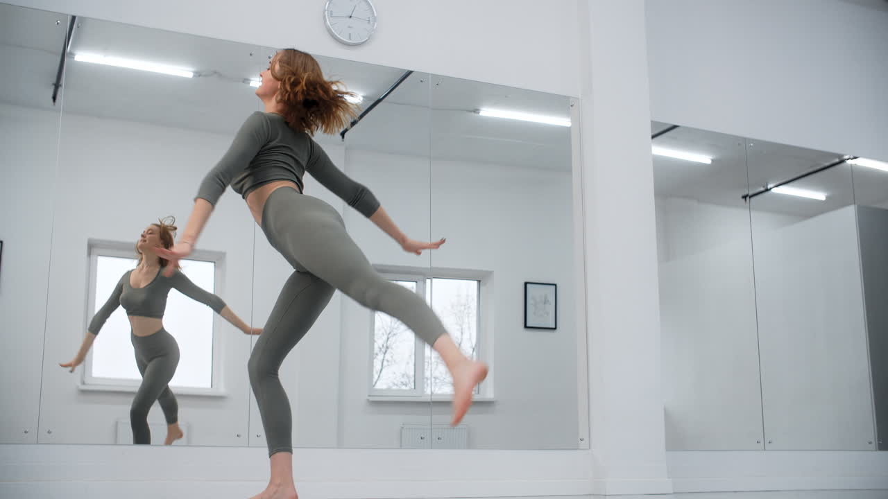 Woman Jumping Jacks in a Gym