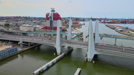 traffic driving at newly built hisingsbron bridge over gota alv river in gothenburg city, sweden