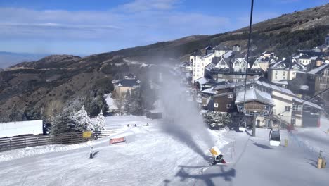 rising aerial shot of a snow machine letting out fresh snow at sierra nevada resort