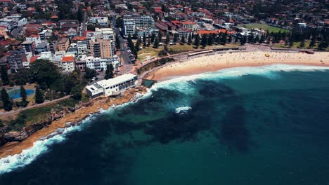 coogee beach, drone pans down towards coogee beach, australia