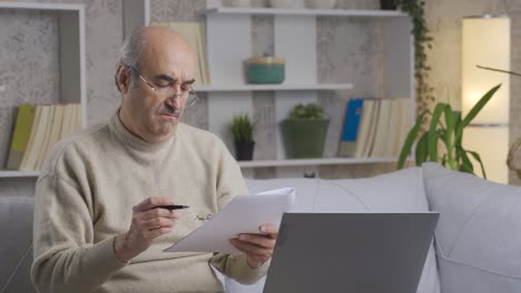 Elderly-businessman-working-from-home.-Self-employed-retired-employee.