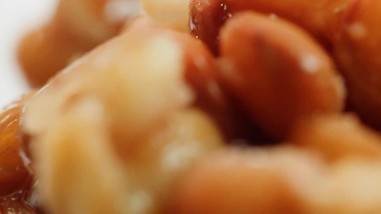 Lentils macro, Open metal can with preserved steamed brown lentils close up isolated on white background