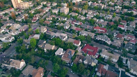 Aerial-view-dolly-in-establishing-of-a-residential-neighborhood-with-exclusive-and-different-houses