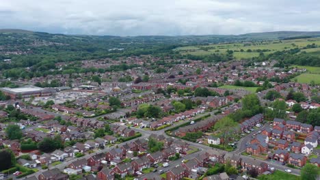 aerial footage over a housing estate in bolton, england