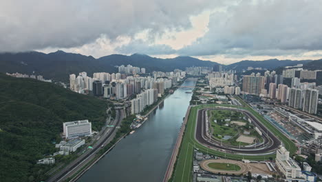 aerial drone view of shatin horse racecourse in shing mun river, hong kong