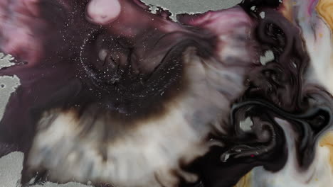 closeup motion video of rupture of fluid materials on boiling