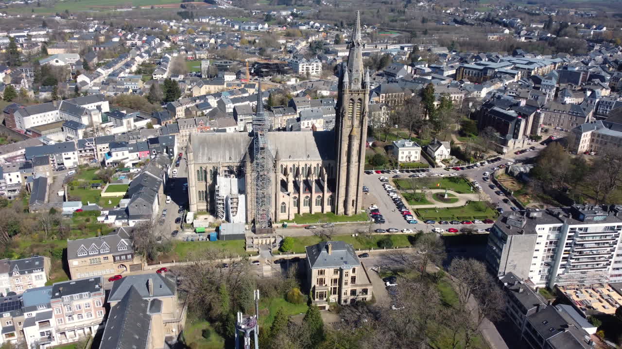 Aerial View of a Belgian Town with a Cathedral Undergoing Renovation