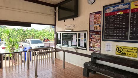 people entering and exiting a train station