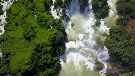 aerial view of ban gioc waterfalls with lush green surroundings