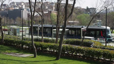 tram in a park in a city