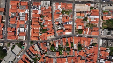 bird's eye view over favela, slum or ghetto in sao luis, brazil - drone shot