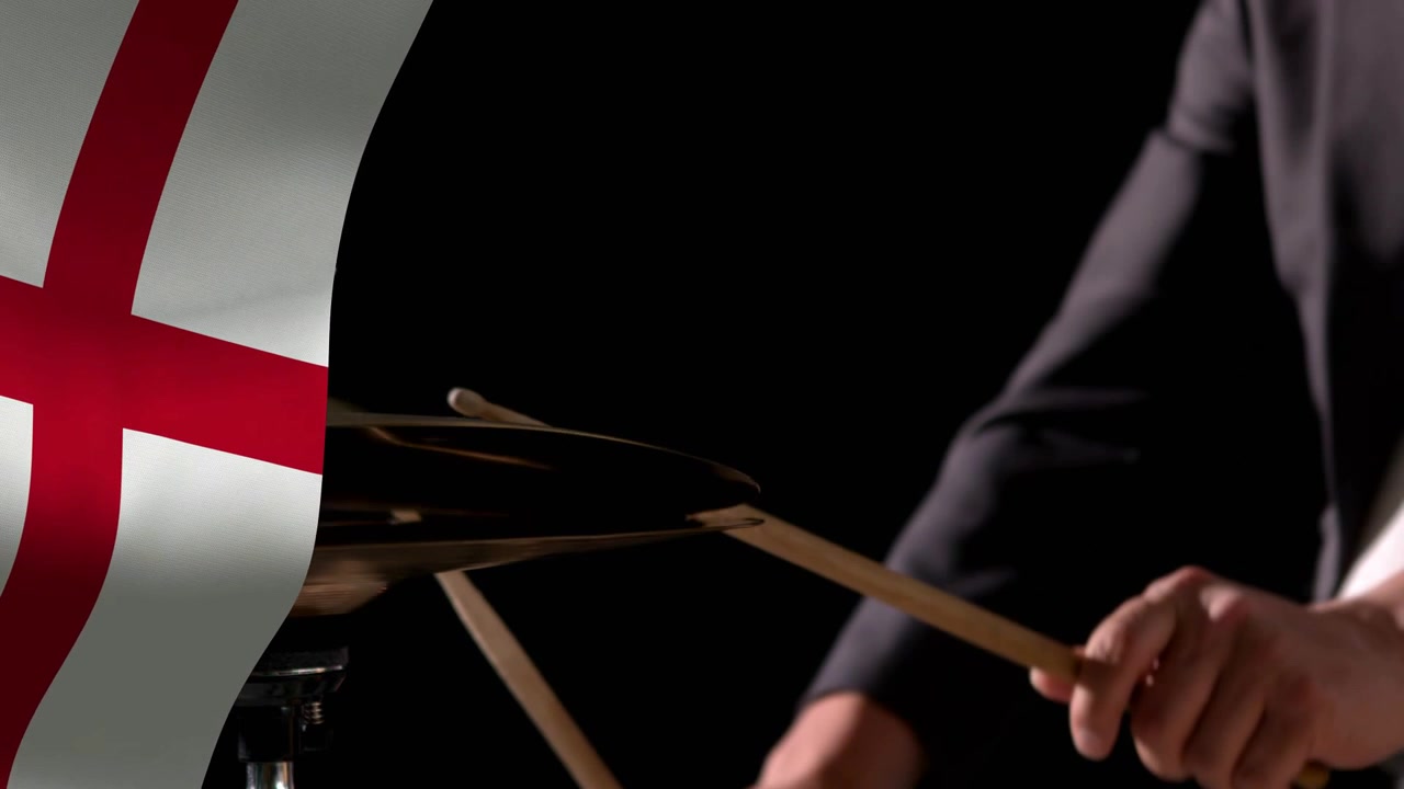 Flag waving starting sequence, musician raising sticks and striking cymbals, demonstrating rhythm