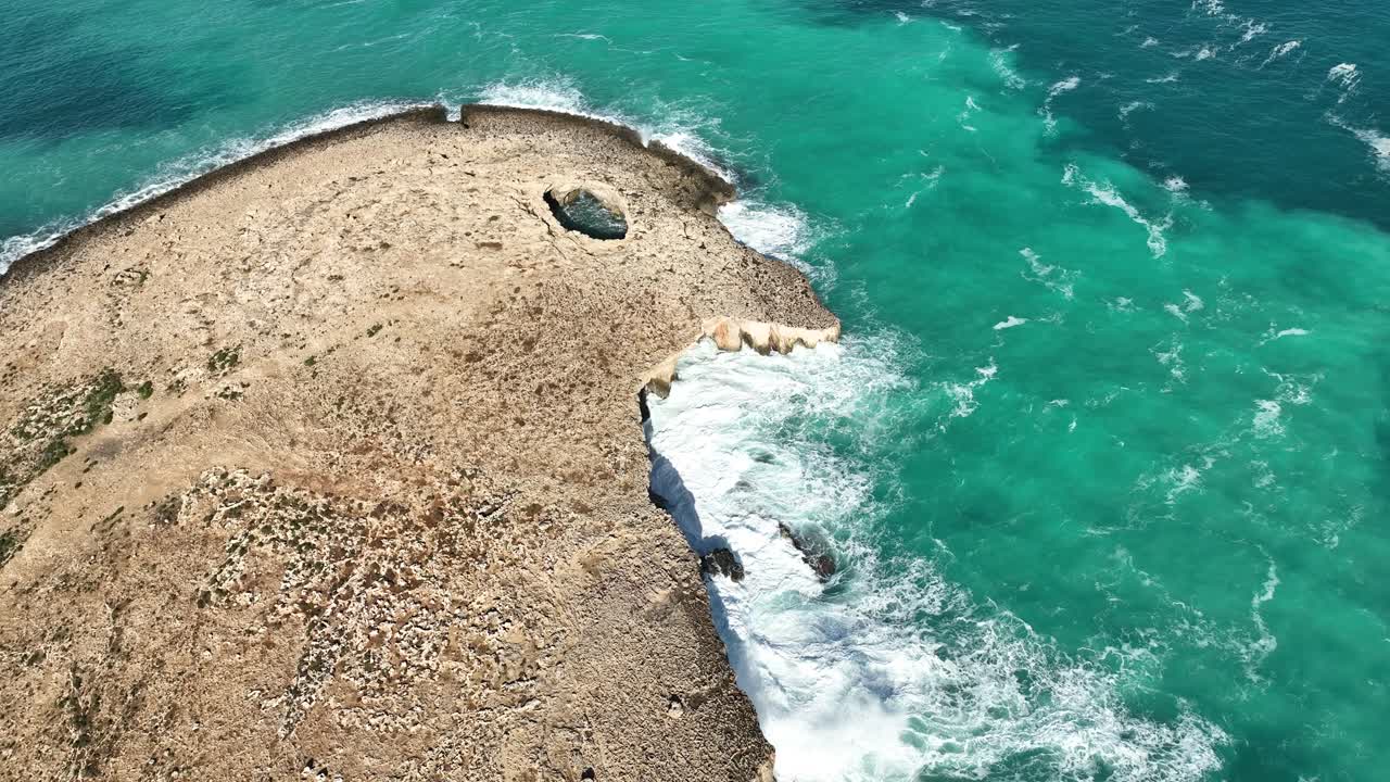 Drone Video Over the 'Bird Head' Looking Coral Lagoon in Malta
