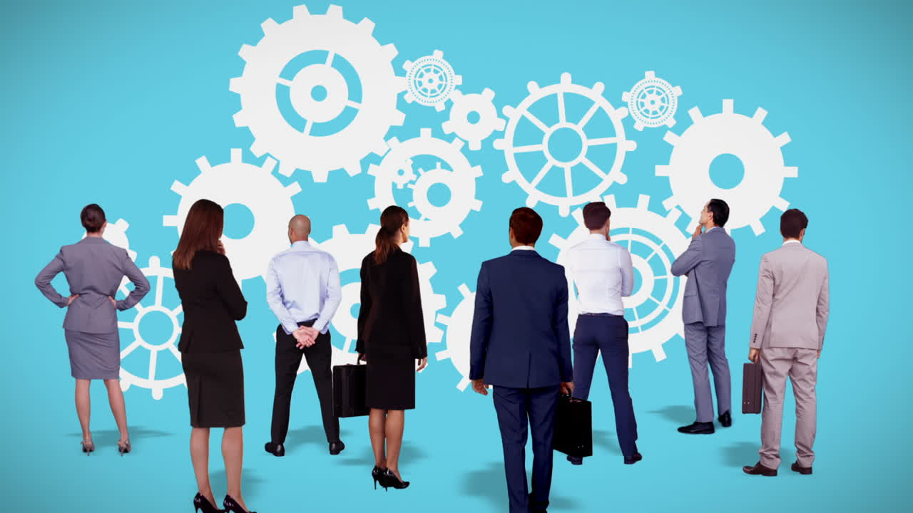 equipo de negocios observando engranajes y ruedas