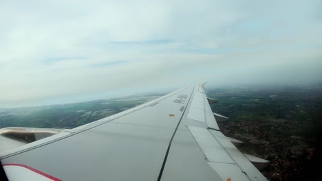 view from the aircraft window to the runway