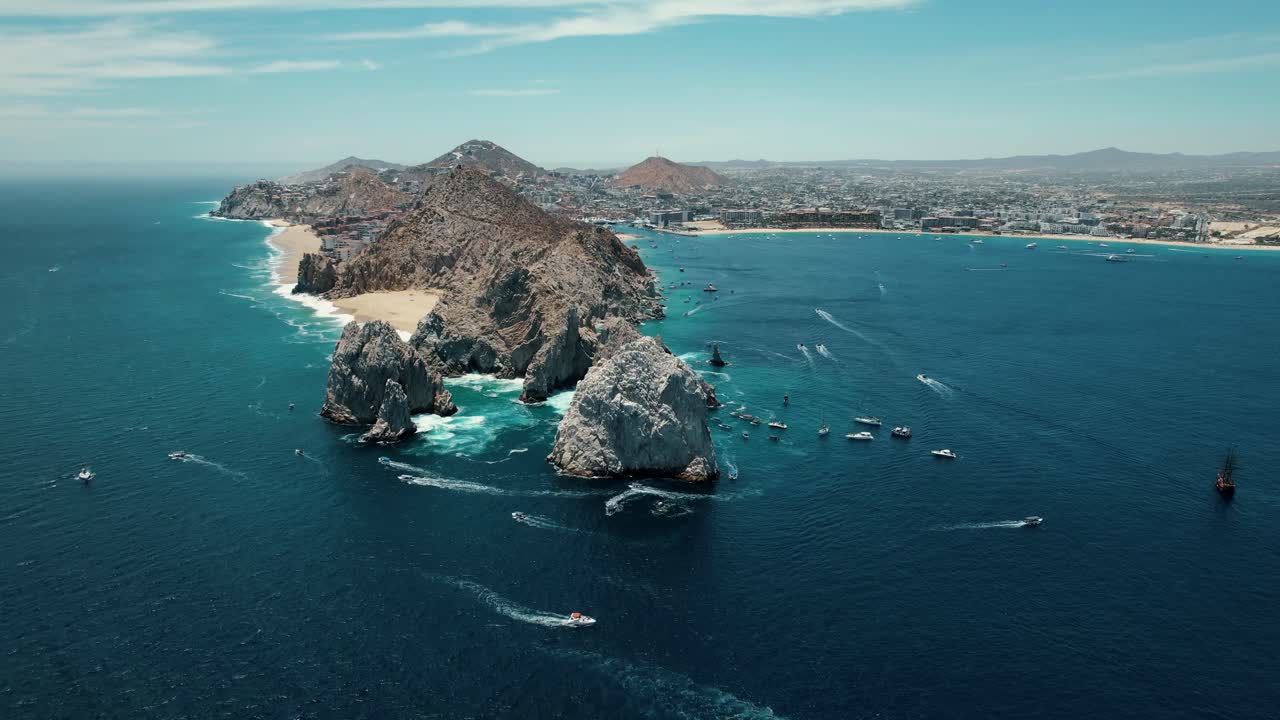 Aerial hyperlapse of boats around the Arch at Land’s End in Cabo San Lucas