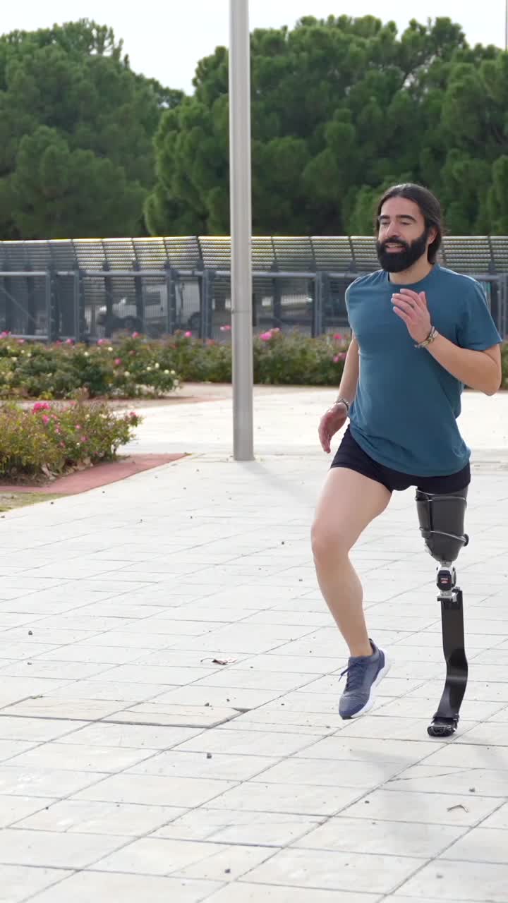 Man with prosthetic leg running outdoors