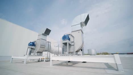 the air conditioning and ventilation system of a large industrial facility is located on the roof. it includes an air conditioner, smoke exhaust, and ventilation.