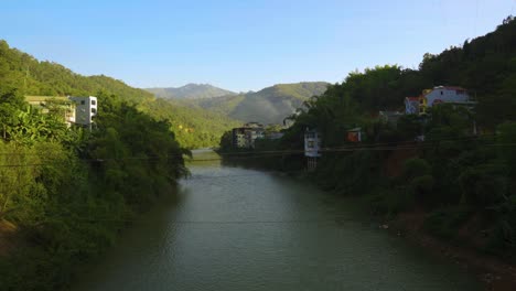 picturesque landscape of hills and river at sunset in bao lac, vietnam