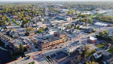 aerial-flyover-of-a-small-suburban-town-in-summer