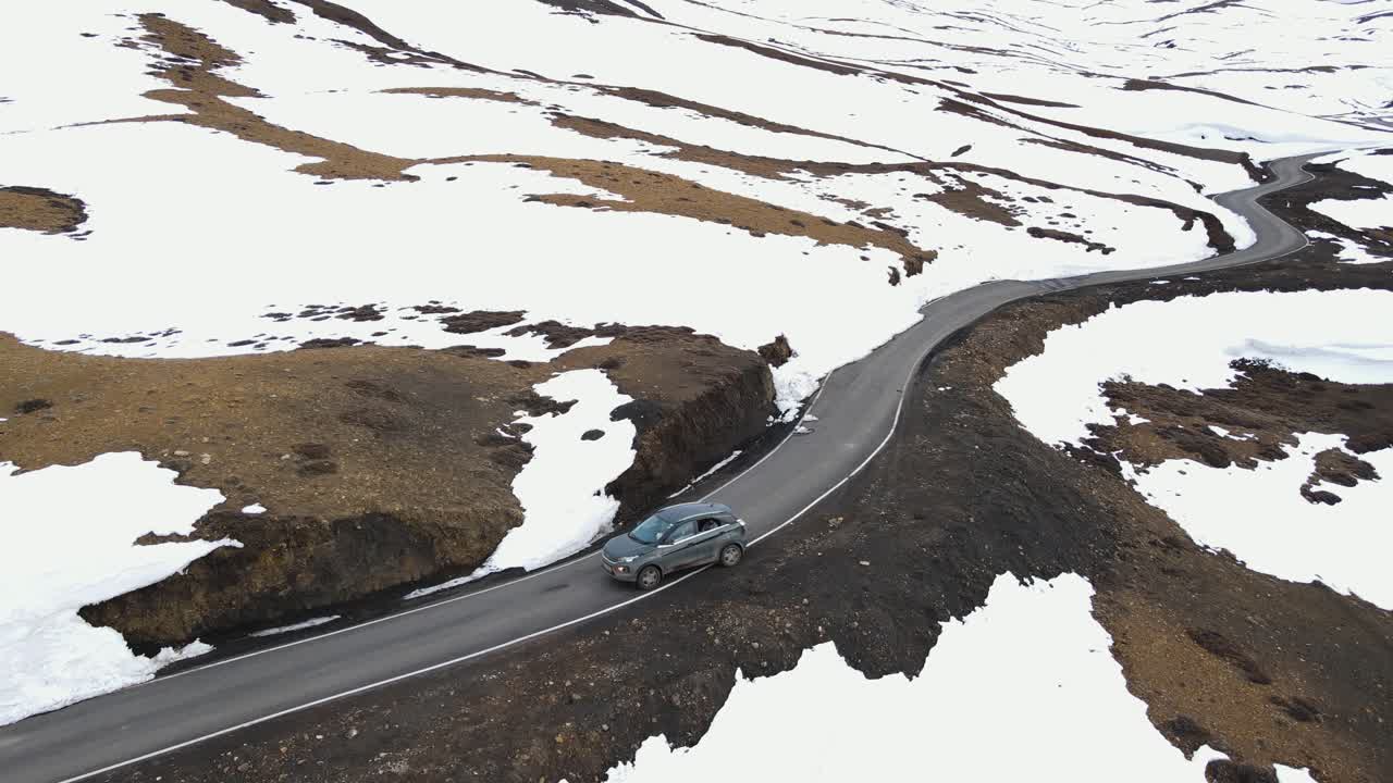 aerial view of jeep off road driving in Spiti district of Himachal Pradesh World's Highest Village india exploration tour