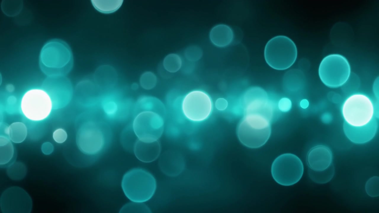 Abstract Teal Bokeh Light Particles Floating on Dark Background
