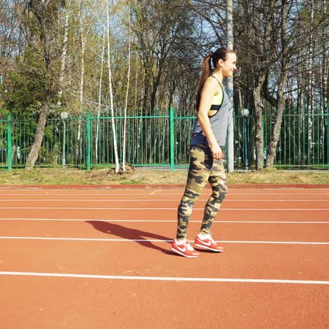 athletic woman running on track. healthy fitness lifestyle.