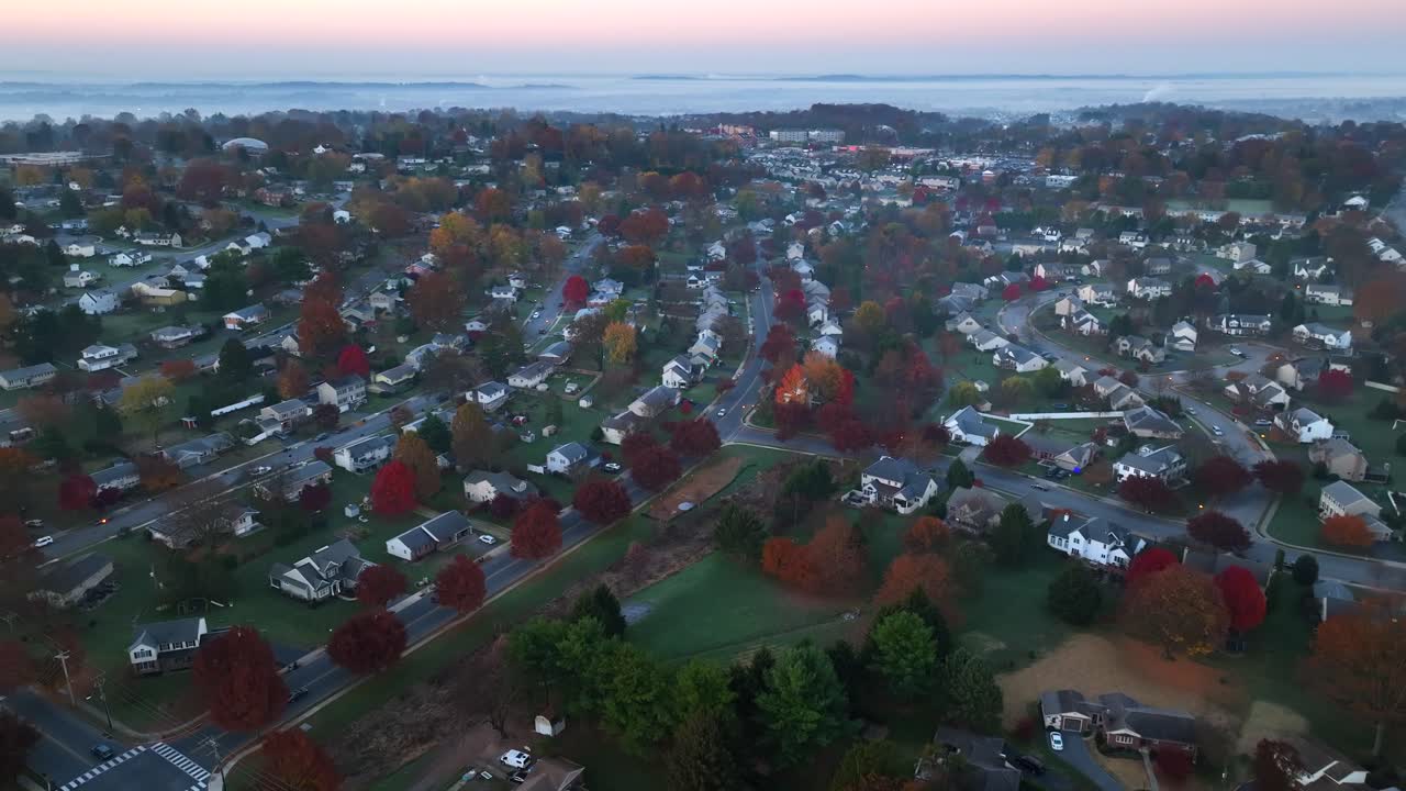 American suburb at dawn with autumnal trees