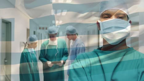 Animation-of-flag-of-greece-over-diverse-surgeons-with-face-masks