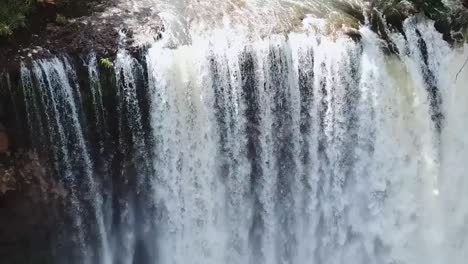 drone aerial waterfall move backward hawaii forest