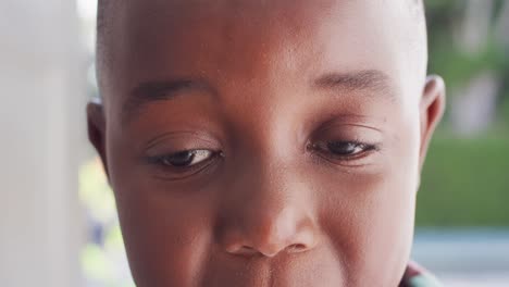 Portrait-of-happy-african-american-boy-at-door