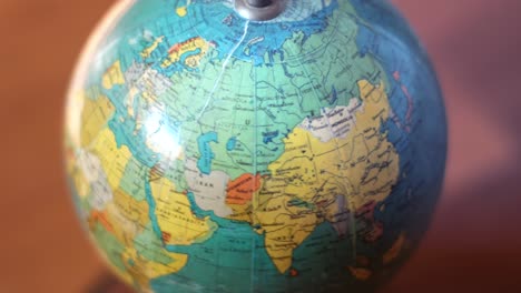 close-up of spinning globe showing atlantic ocean and surrounding continents