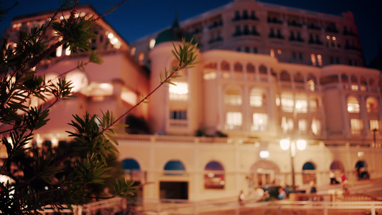 Monte Carlo, Monaco - October 14, 2024: The facade of Hotel de Paris in the evening