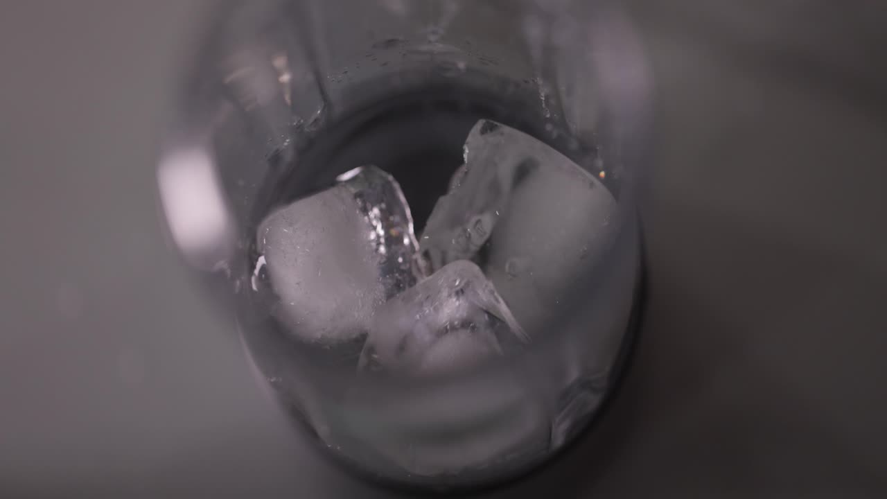 Ice Cube Falling into Blender, Top View, 4K Slow Motion