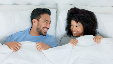 love, couple and in bed with smile