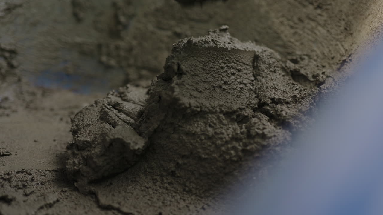 Close up on mason brick laying process