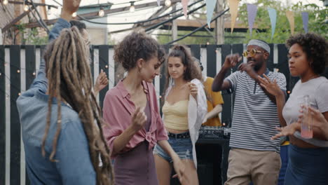 friends dancing at an outdoor party