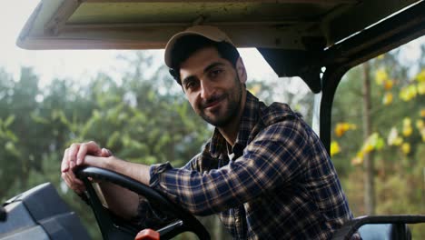 farmer driving a tractor